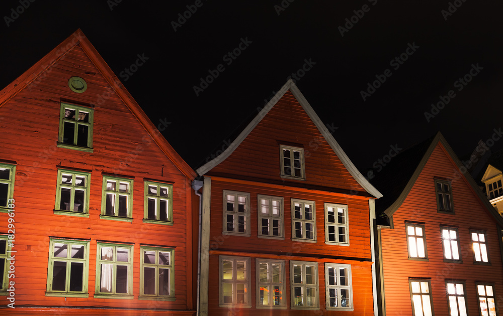 Norwegian red wooden houses at night