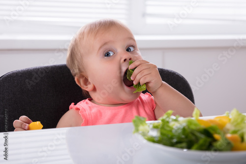 Baby Girl Eating Healthy Food