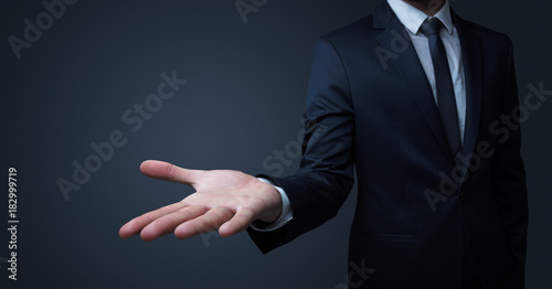 Businessman handing something without concept