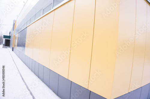 the yellow wall along the store