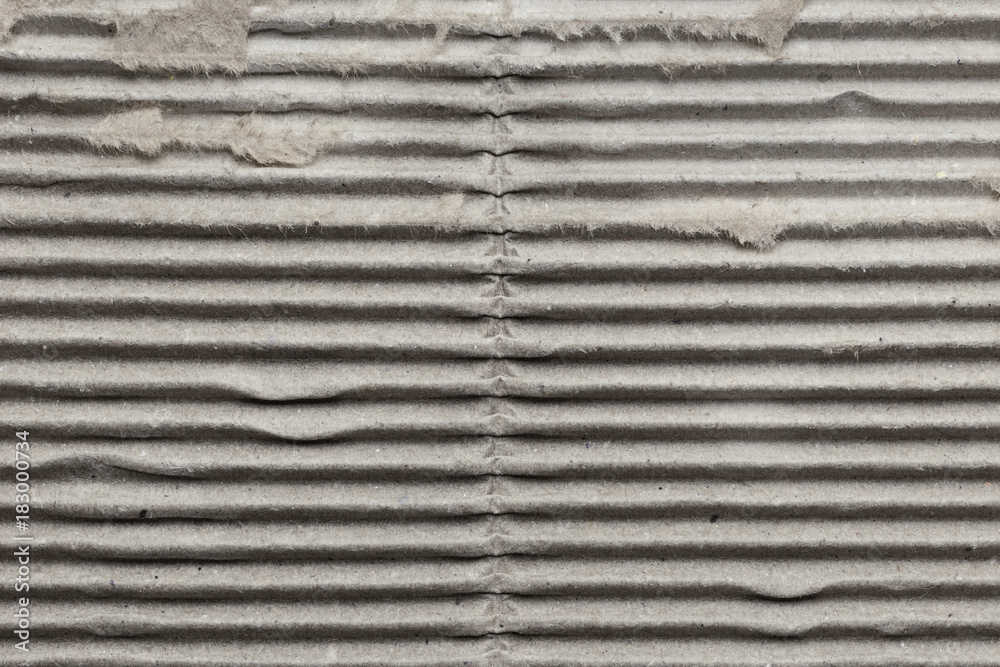 Gray striped old corrugated cardboard, background