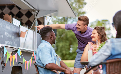 happy customers or friends at food truck