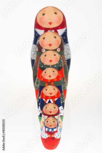 Set of Russian dolls babushka matryoshka lined up one behind other in growth