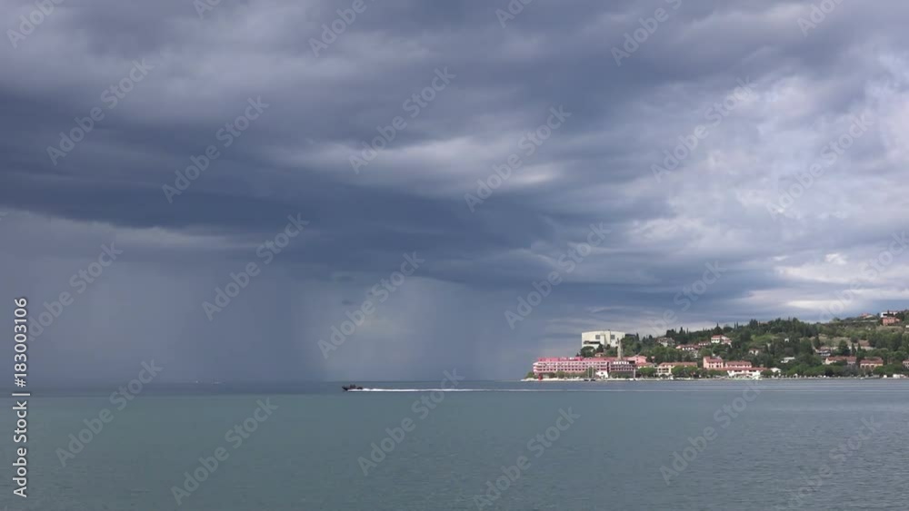 Rainy clouds over Portoroz on Slovenian Adriatic sea coast Rainy clouds over Portoroz on Slovenian Adriatic sea coast