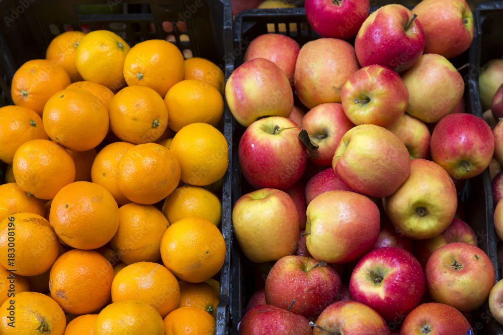 boxes with apples and oranges in the market boxes with apples and oranges in the market