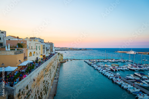 OTRANTO, ITALY - AUGUST 23, 2017 - panoramic view from the old town at sunset during turistic season