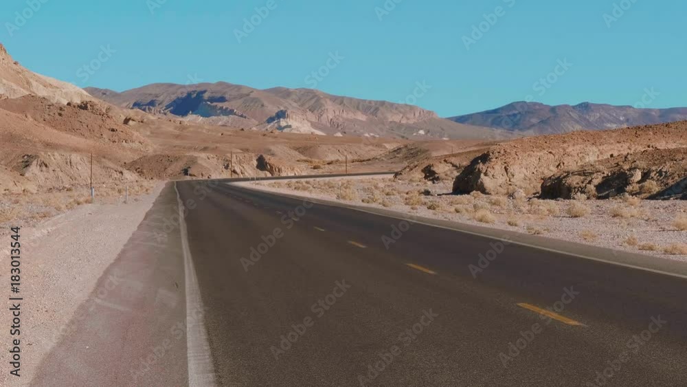 Lonesome street through Death Valley in California Lonesome street through Death Valley in California