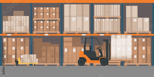 Warehouse interior with goods and pallet trucks