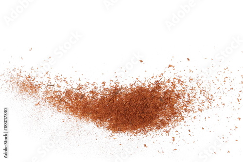 Leinwand Poster pile cinnamon powder isolated on white background, with top view
