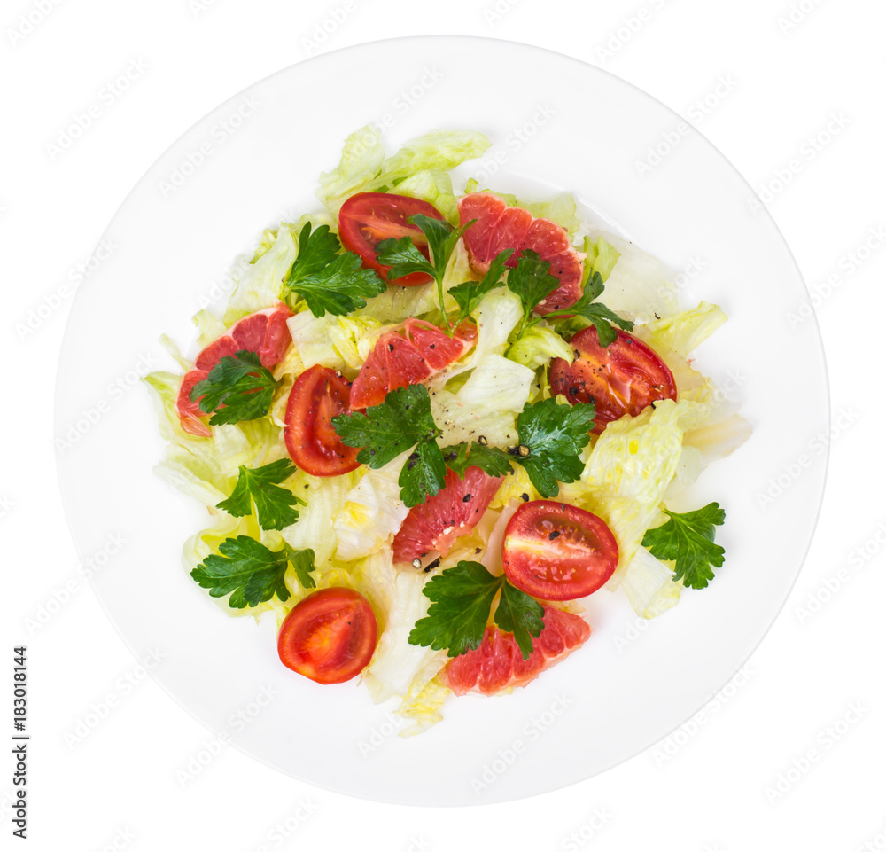 Vegetarian salad from cabbage, tomatoes and grapefruit Vegetarian salad from cabbage, tomatoes and grapefruit
