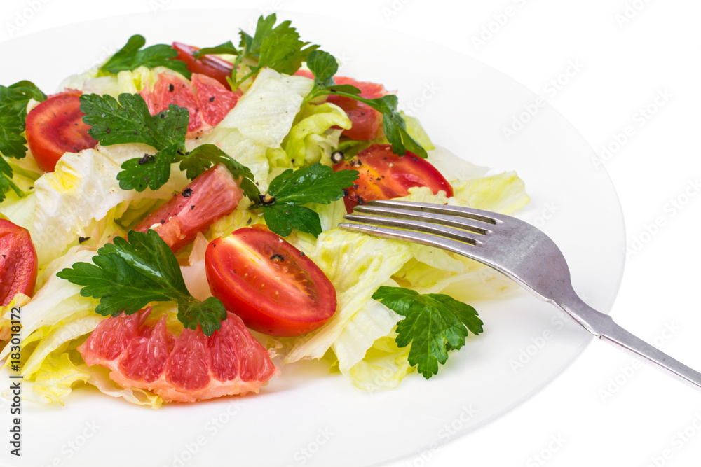 Vegetarian salad from cabbage, tomatoes and grapefruit