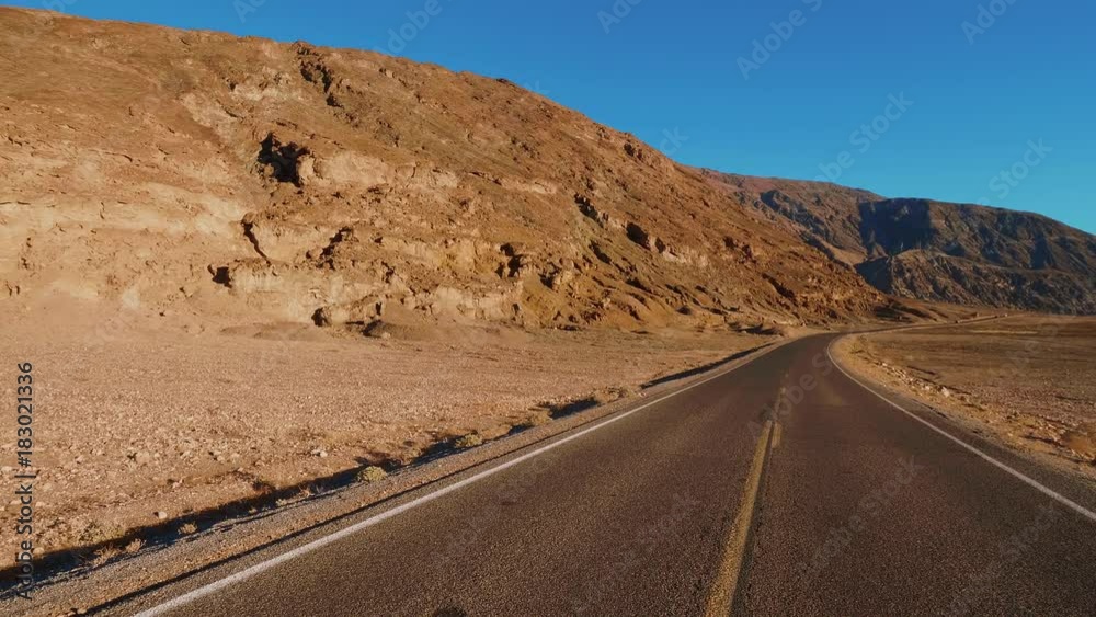 Scenery road through the amazing landscape of Death Valley National Park California Scenery road through the amazing landscape of Death Valley National Park California