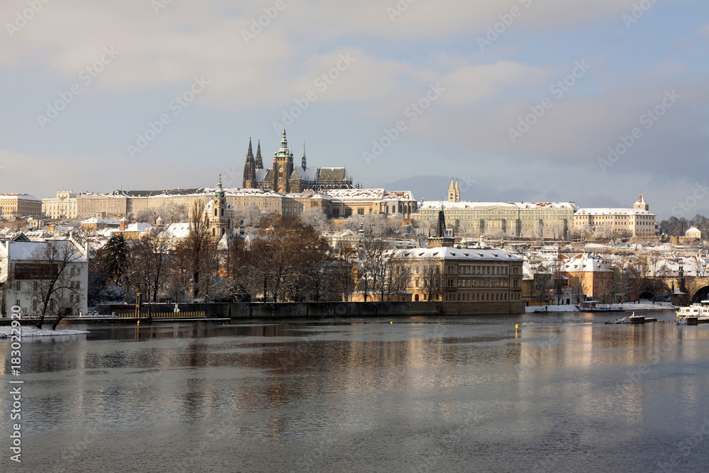 Obraz premium Christmas snowy Prague Lesser Town with gothic Castle, Czech republic