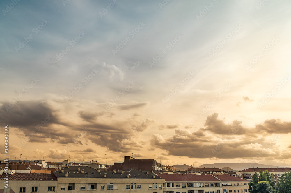 skyline with top roofs with magical sky. spain