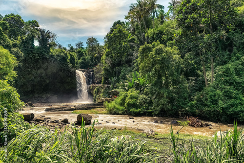 Fotografija big and magical waterfall in bali. indonesia