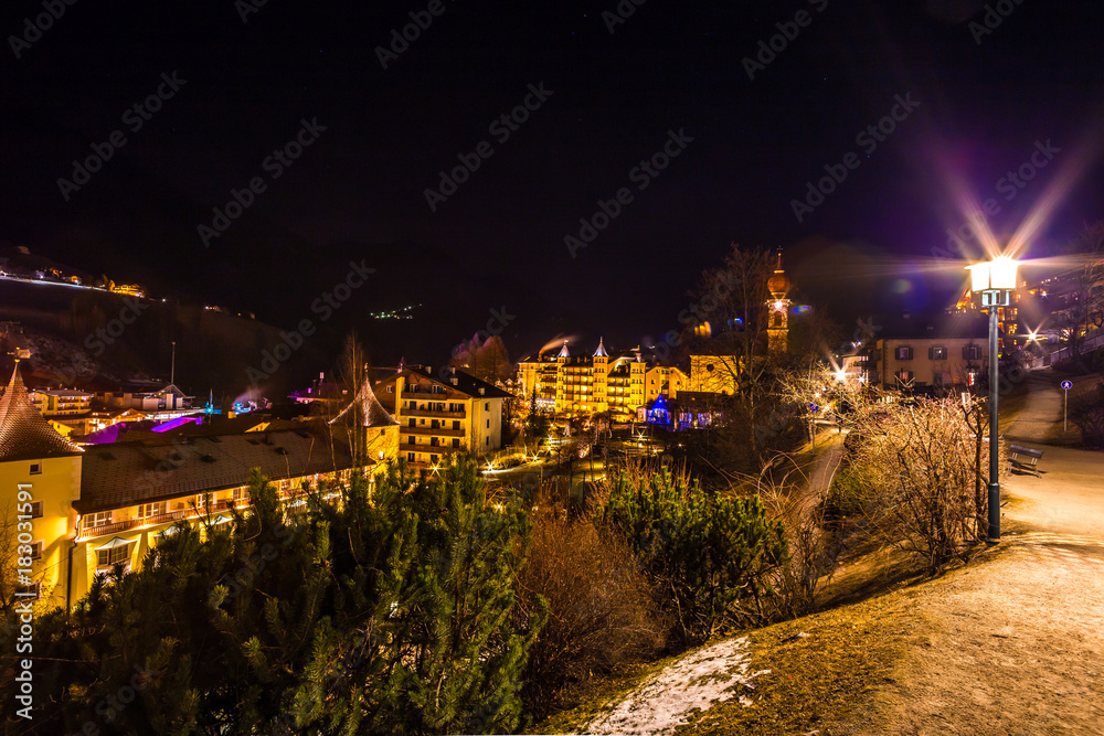 night view of mountain village in alpine valley