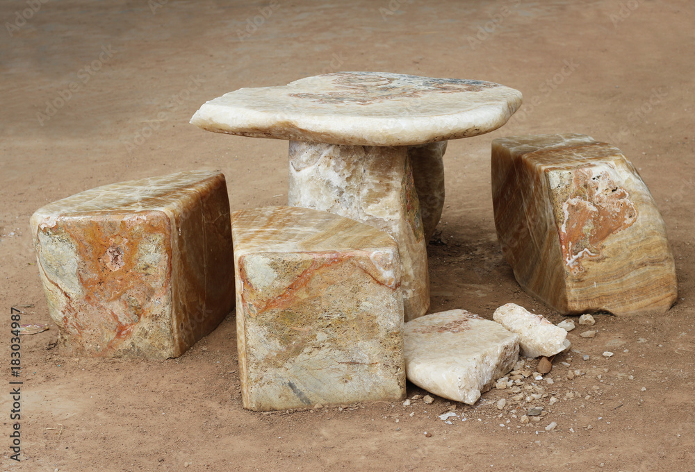 chairs and tables made of marble. chairs and tables made of marble.