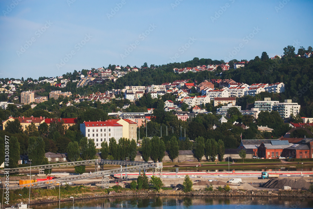 View of Oslo city, capital of Norway, with Sentrum borough, new district and harbour, view from Oslo Opera House, Eastern Norway View of Oslo city, capital of Norway, with Sentrum borough, new district and harbour, view from Oslo Opera House, Eastern Norway
