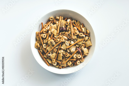 Snack mix with chex, pretzels, nuts, and pumpkin seeds