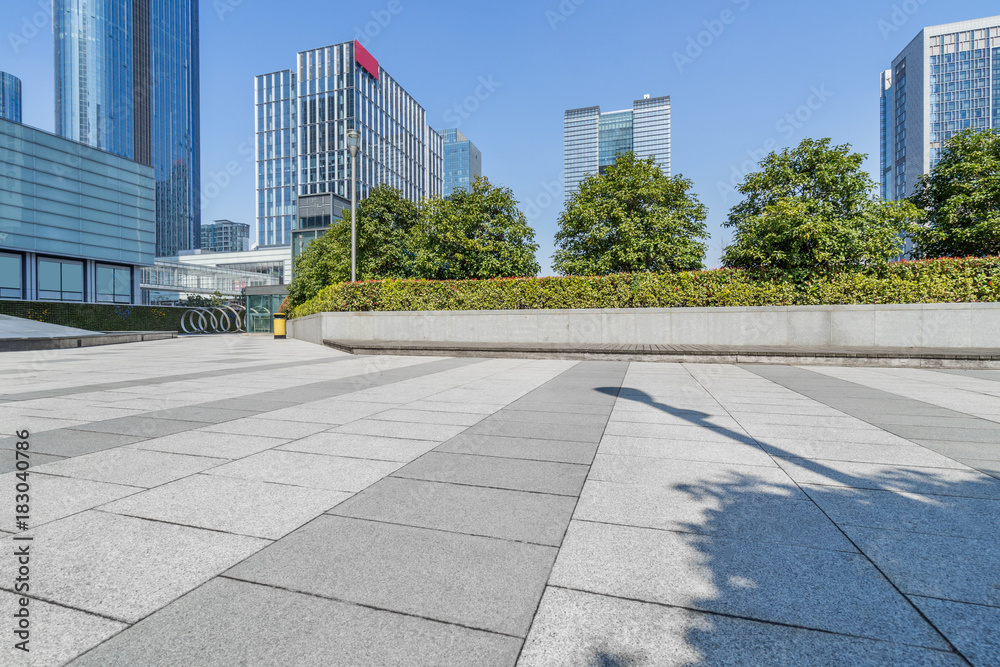 modern buildings and empty pavement in china.. modern buildings and empty pavement in china..