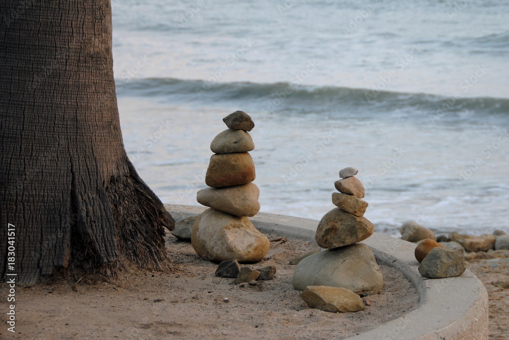 Fototapeta premium Piles of stones at Ventura Beach