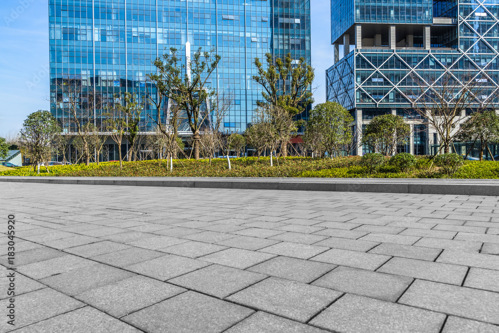 Fototapeta premium modern buildings and empty pavement in china..
