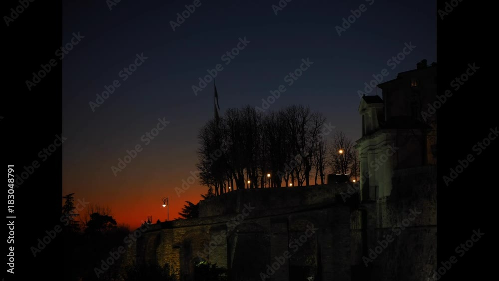 Bergamo, old city. Italy, Timelapse sunset at Saint Giacomo ancient door Bergamo, old city. Italy, Timelapse sunset at Saint Giacomo ancient door