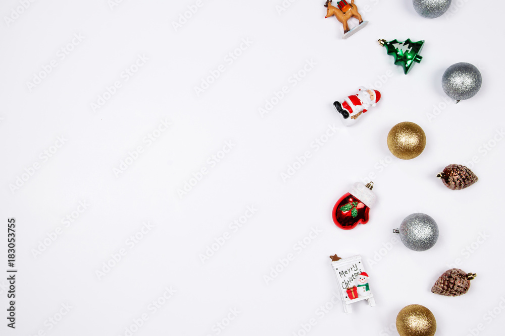 Christmas holiday background. Santa claus, Reindeer, Snowman and decorative christmas ornaments on a white background with copy-space. Top view.