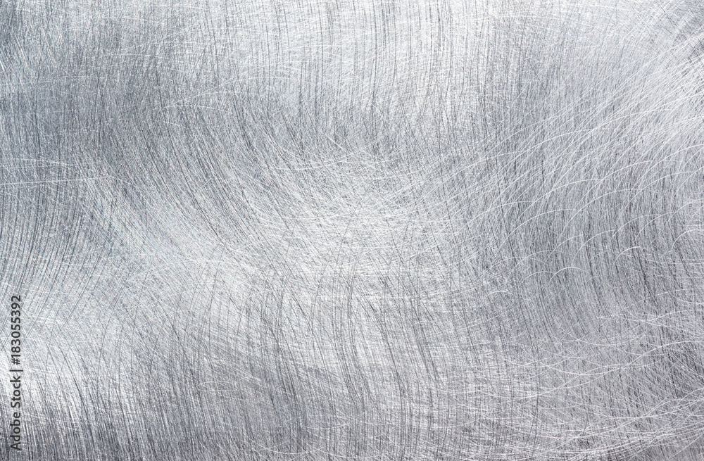 Scratched metal or aluminum surface, industrial texture background Scratched metal or aluminum surface, industrial texture background