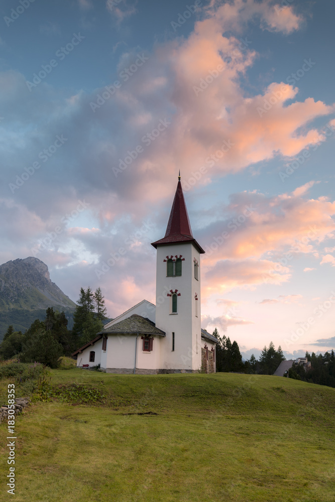 Clouds at sunset on Chiesa Bianca, Maloja, Bregaglia Valley, Engadine, Canton of Graubunden, Swiss Alps Clouds at sunset on Chiesa Bianca, Maloja, Bregaglia Valley, Engadine, Canton of Graubunden, Swiss Alps