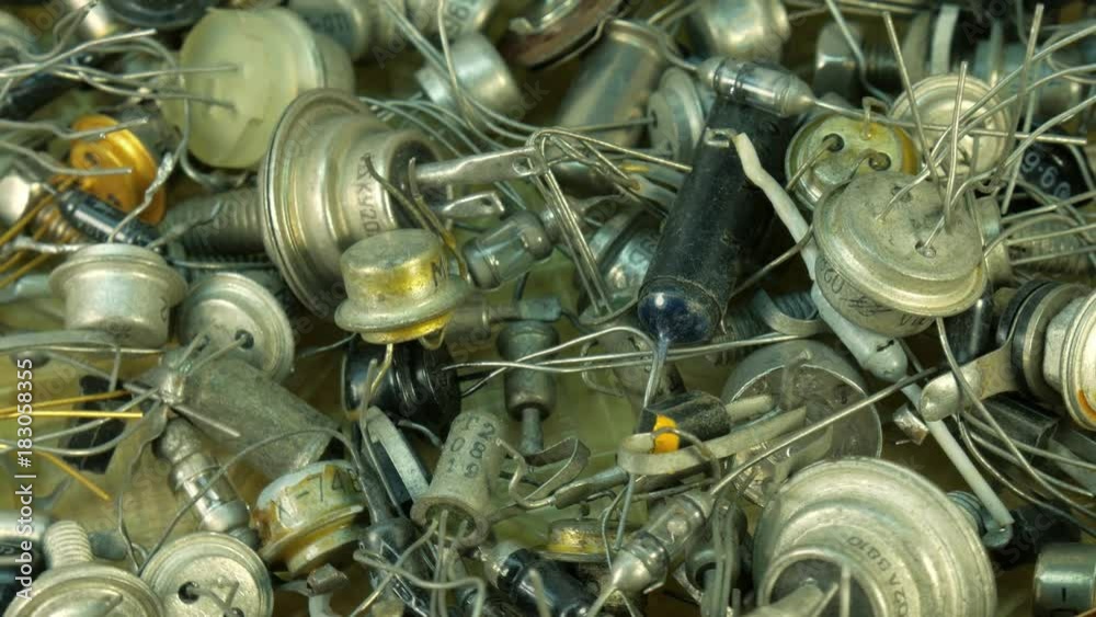 Background pile of old Radio components, diode end transistor with led bulbs. Background pile of old Radio components, diode end transistor with led bulbs.