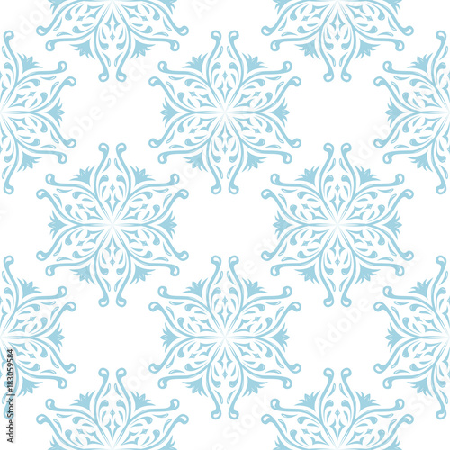 Blue flowers on white background. Ornamental seamless pattern © Liudmyla