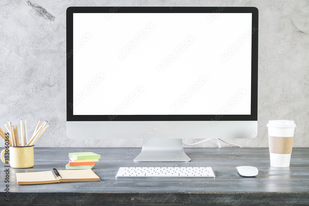 Fototapeta premium Creative desktop with clean white computer screen