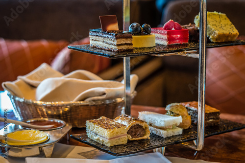 three tier afternoon tea set and pastries