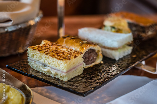 three tier afternoon tea set and pastries