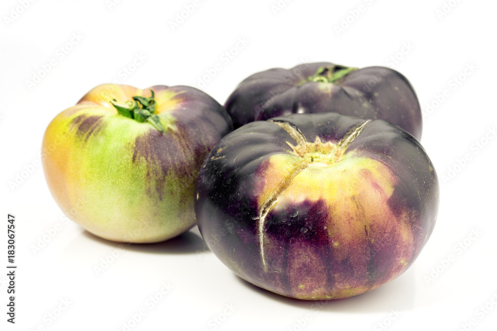 group of tomatoes isolated on white group of tomatoes isolated on white