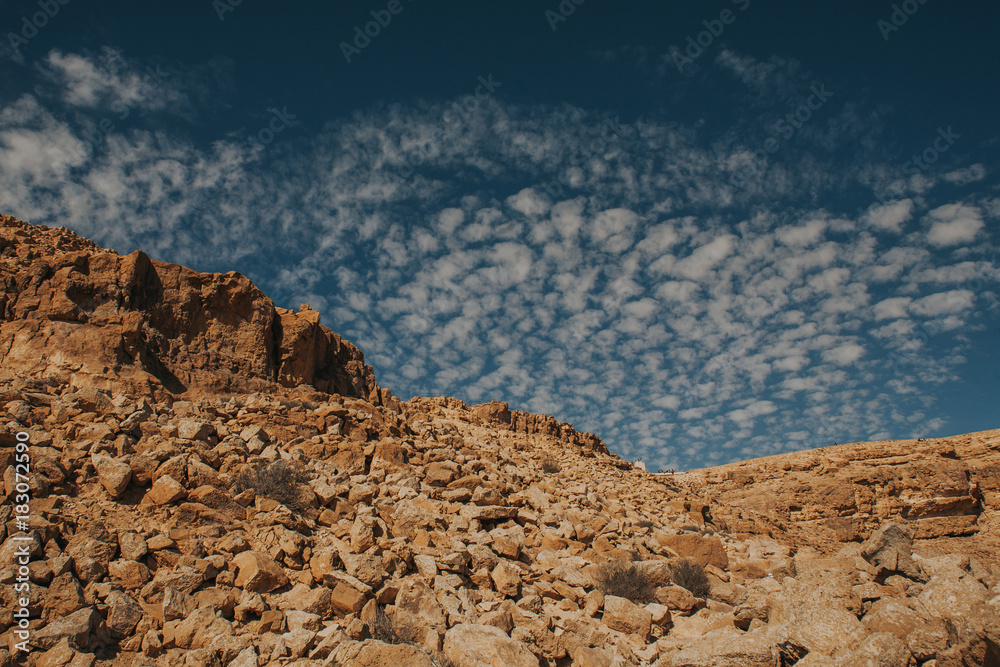 Rocky hill on desert in Israel. Ramon crater landscape.