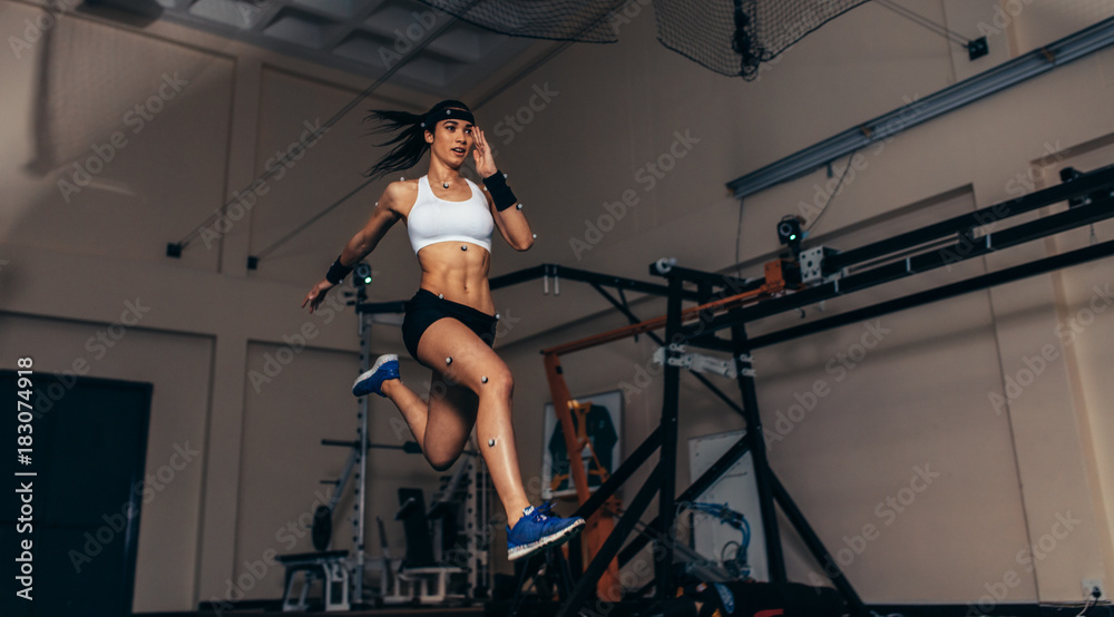 Movement and performance monitoring of runner in biomechanical l - obrazy, fototapety, plakaty 