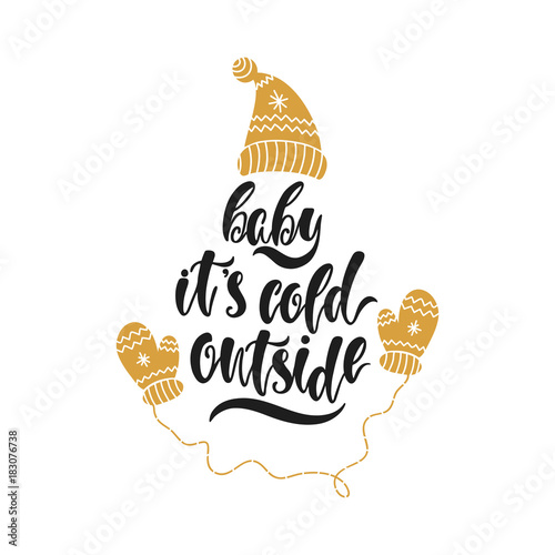 2135618 Baby it's cold outside. Hand drawn calligraphy text. Holiday typography design with hat and mittens. Black and gold christmas card