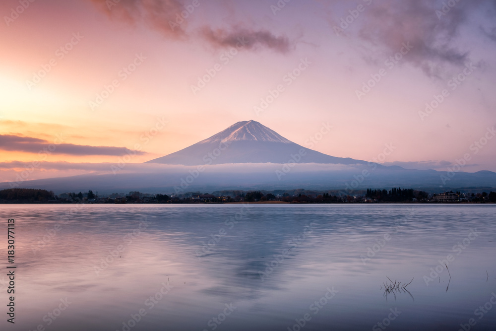 Beautiful volcano mount Fuji reflection on lake in dawn at Kawaguchiko Beautiful volcano mount Fuji reflection on lake in dawn at Kawaguchiko