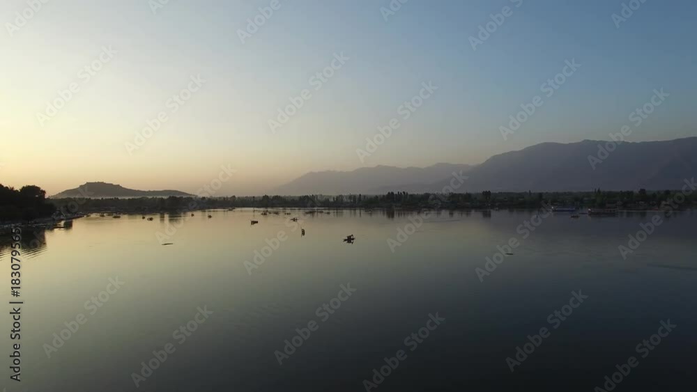 Aerial video on amazing romantic lake at the sunset.
Srinagar Dal Lake aerial view, Aerial view of Srinagar Dal Lake with local people use Shikara. Jammu and Kashmir, India, Drone.