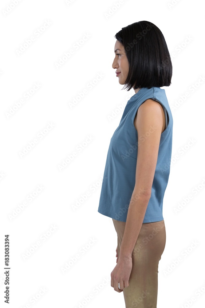 Female executive standing against white background Female executive standing against white background