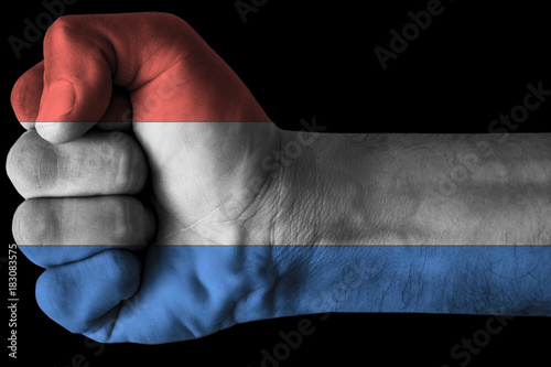 Fist painted in colors of netherlands flag, fist flag, country of netherlands