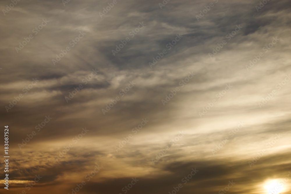 Horizontal photo of a beautiful sunset sky rich in abstract clouds and colors