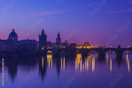 Beautiful morning in Prague. Charles Bridge and    Vltava River at dawn  © vitaprague