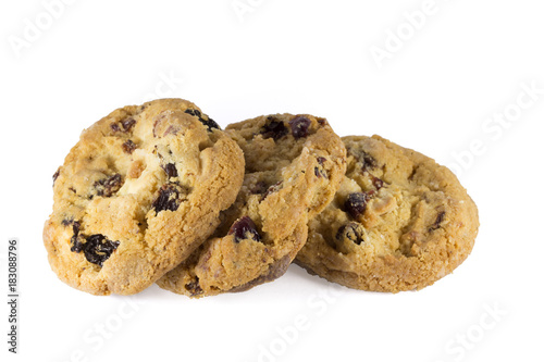Isolated cranberry cookies. Seven delicious cookies isolated on white background with a clipping path. Close up side view.