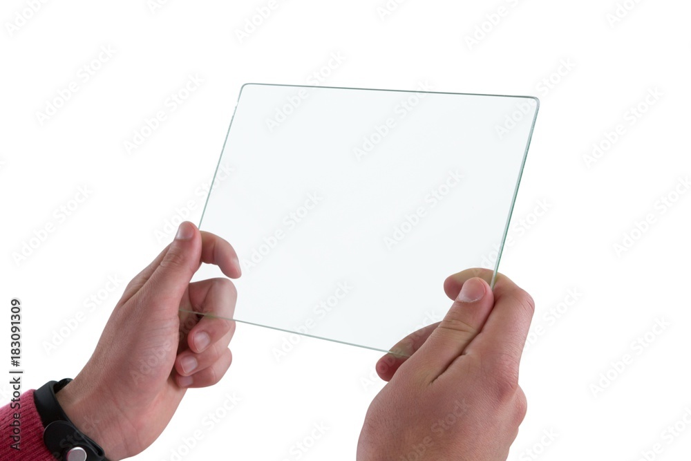 Close-up of man holding glass digital tablet