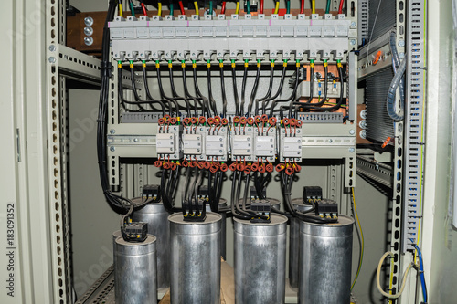High-power capacitors installed in the electric box photo