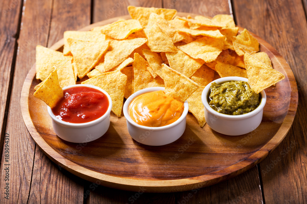 mexican nachos corn chips with guacamole, salsa and cheese dip mexican nachos corn chips with guacamole, salsa and cheese dip