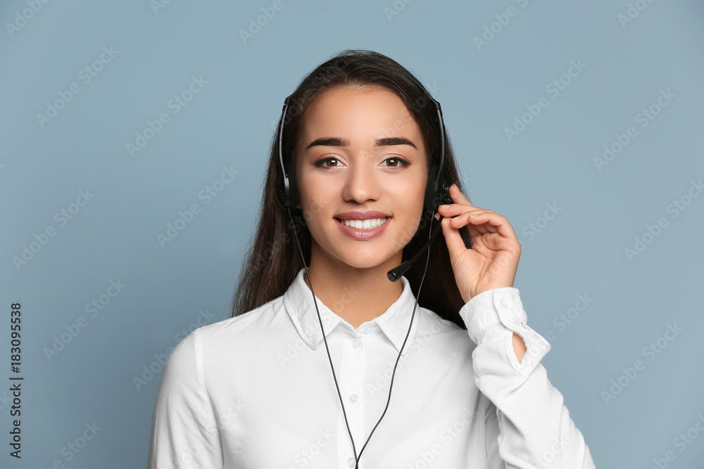 Female consulting manager with headset on color background Female consulting manager with headset on color background
